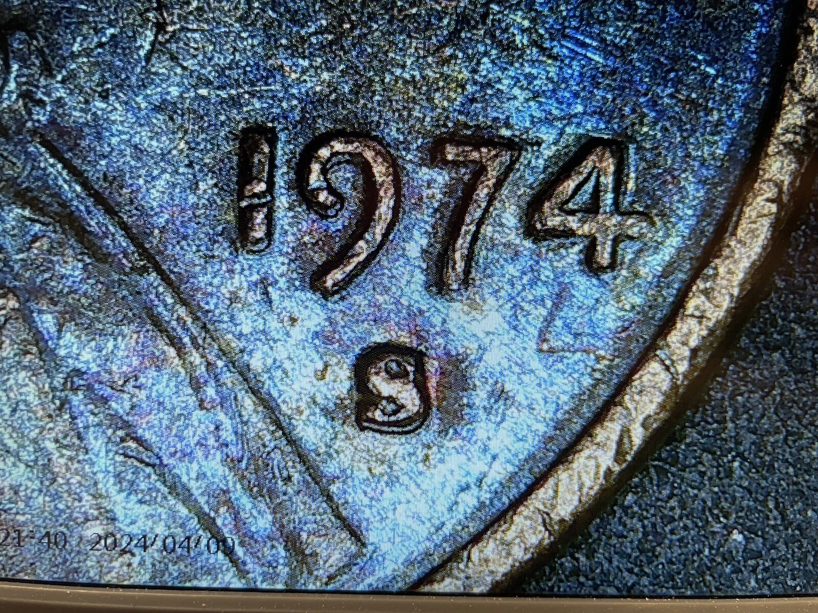 1974-S DDO FS-101 comparison: common coin flat LIBERTY lettering versus genuine DDO split serifs under magnification
