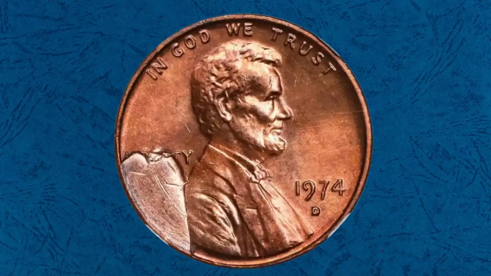 1974-S Lincoln penny die break showing raised cud error at rim caused by die metal fracture during striking